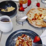 crepes with apple stuffingvwithvapples and caramel sauce on the side