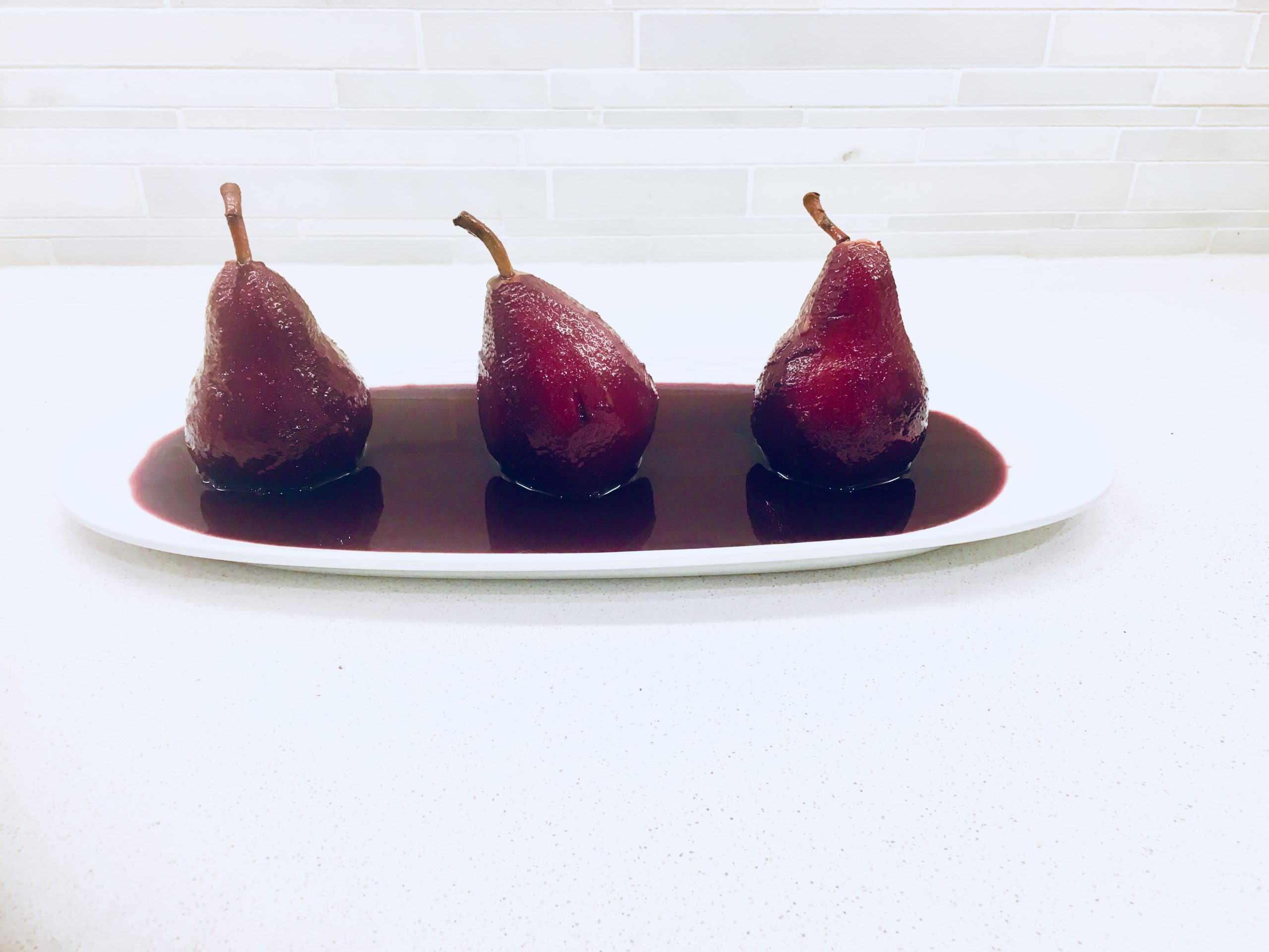 Poached pears in red wine