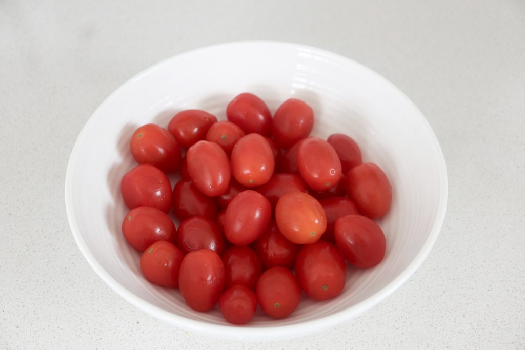 cherry tomatoes in a white bowl