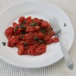 roasted tomatoes on white plate