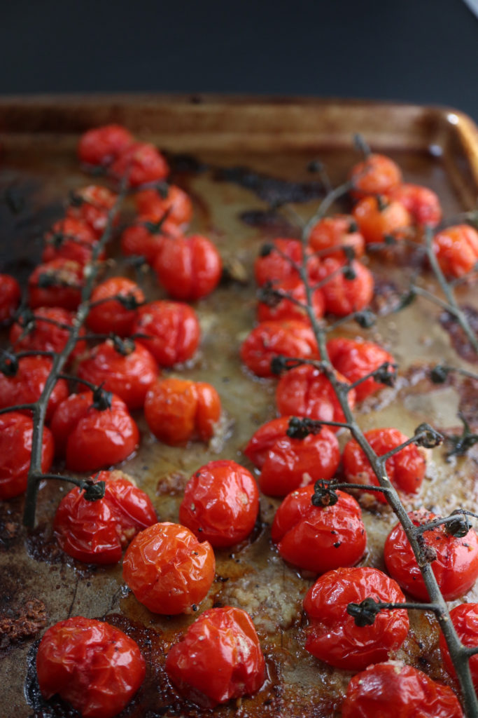 roasted tomatoes on a baking pan