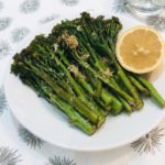 grilled broccolini on a plate