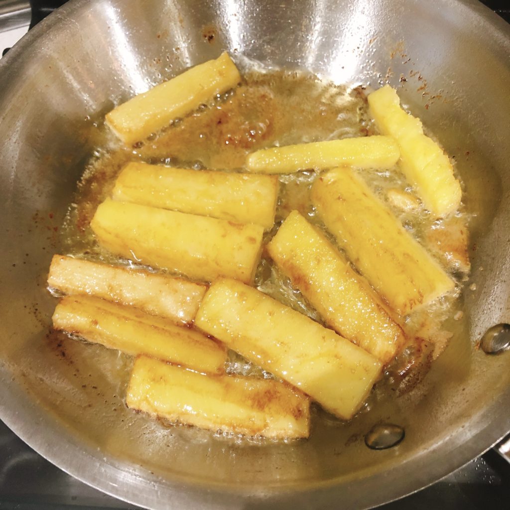 Fried pineapple in sauce pan