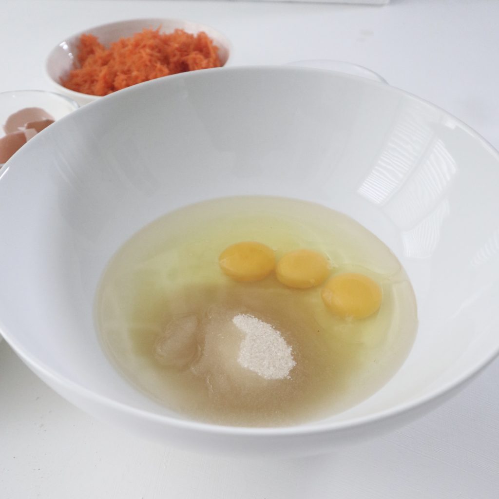 eggs, sugar, oil in a bowl.