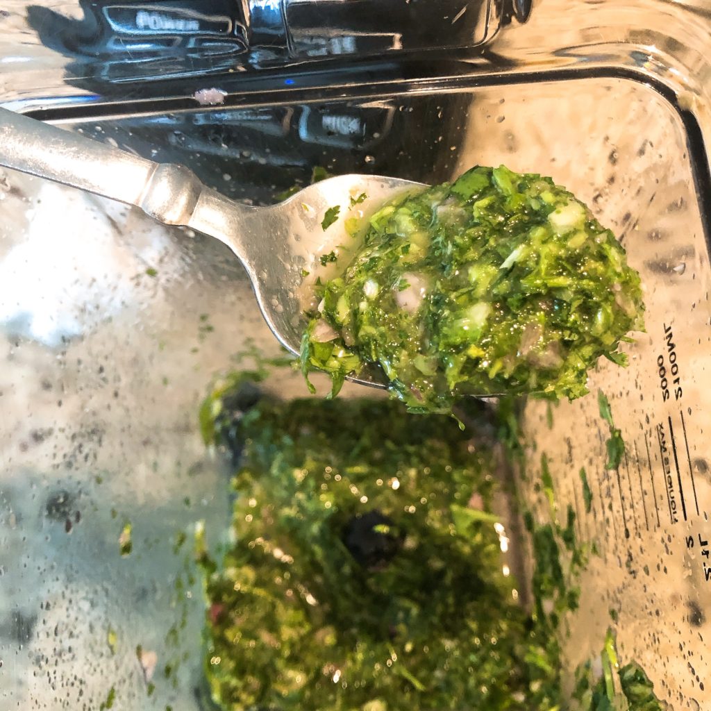 chimichurri sauce on a spoon