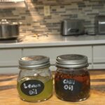 lemon oil and chili oil in glass jars