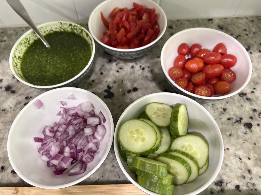 red onion, tomatoes, cucumbers, peppers, chimichurri sauce